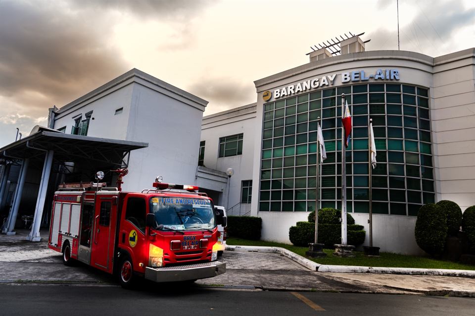 The Barangay Bel-Air hall with a red fire truck in front