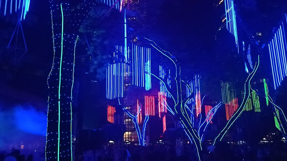 Trees wrapped in blue and green lights at Ayala Triangle